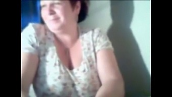 A Mature Woman Displays Her Breasts On A Webcam